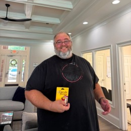a man holding a card