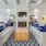 Spacious well lit clubhouse with fire place 